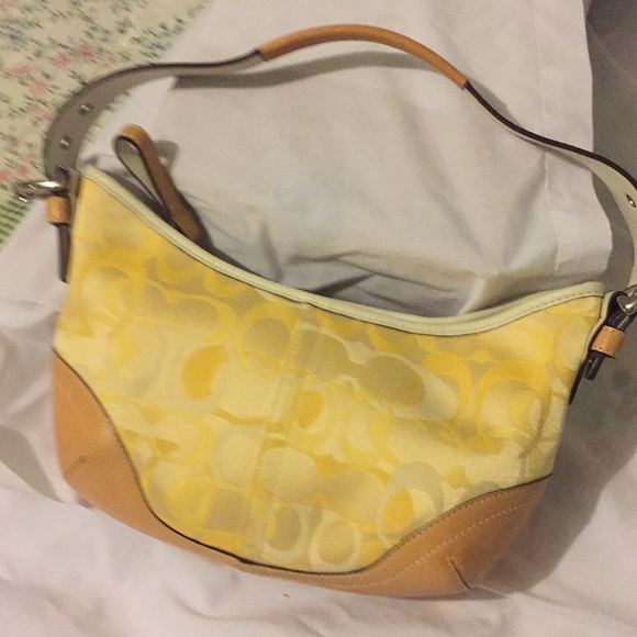 small yellow coach purse